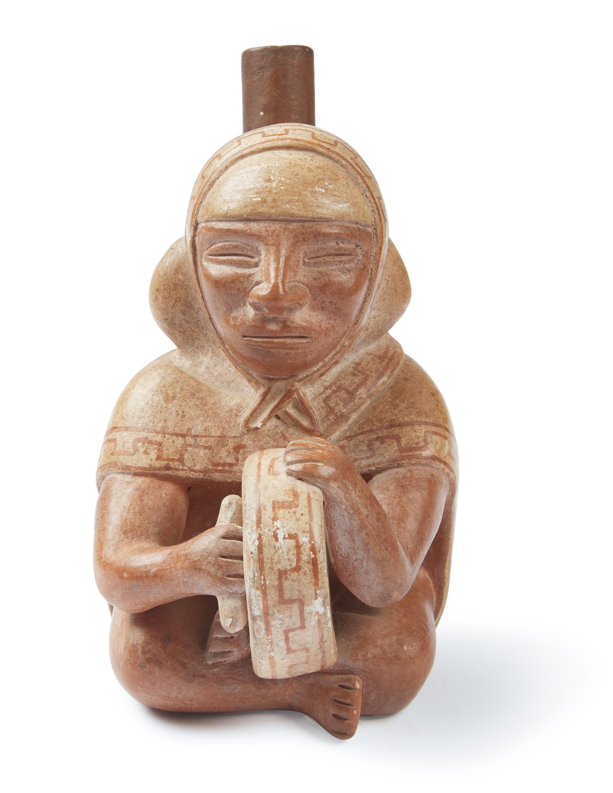 A Moche Stirrup Vessel in the form of a Shaman Drummer