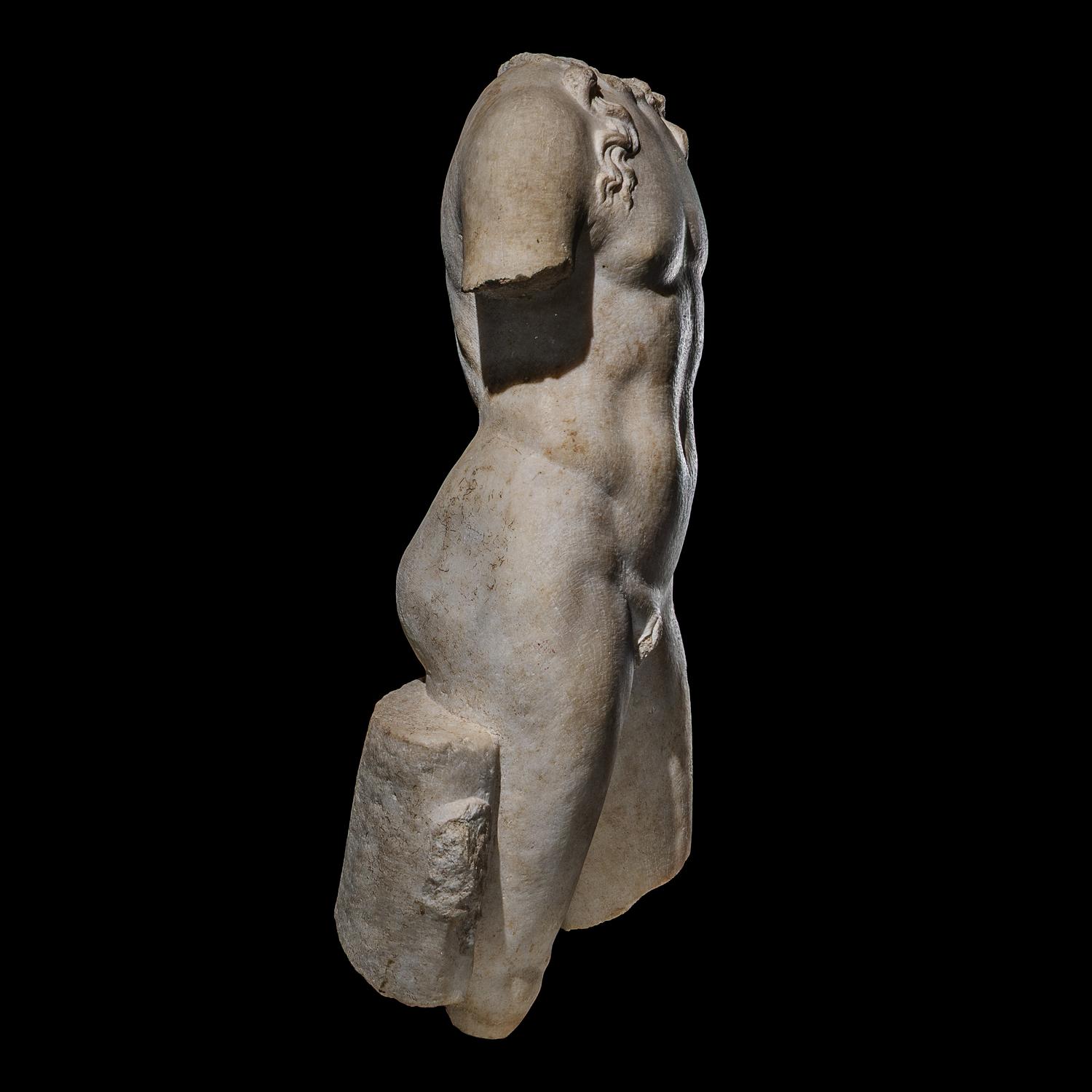 A Roman Marble Torso of a Youthful God