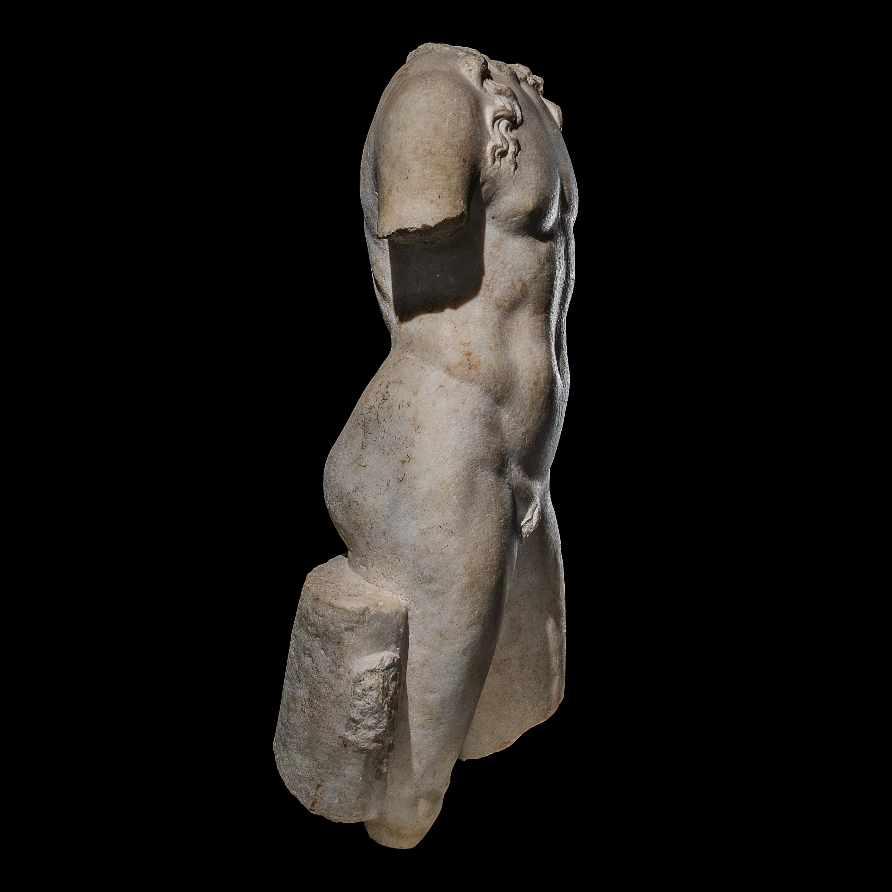 A Roman Marble Torso of a Youthful God