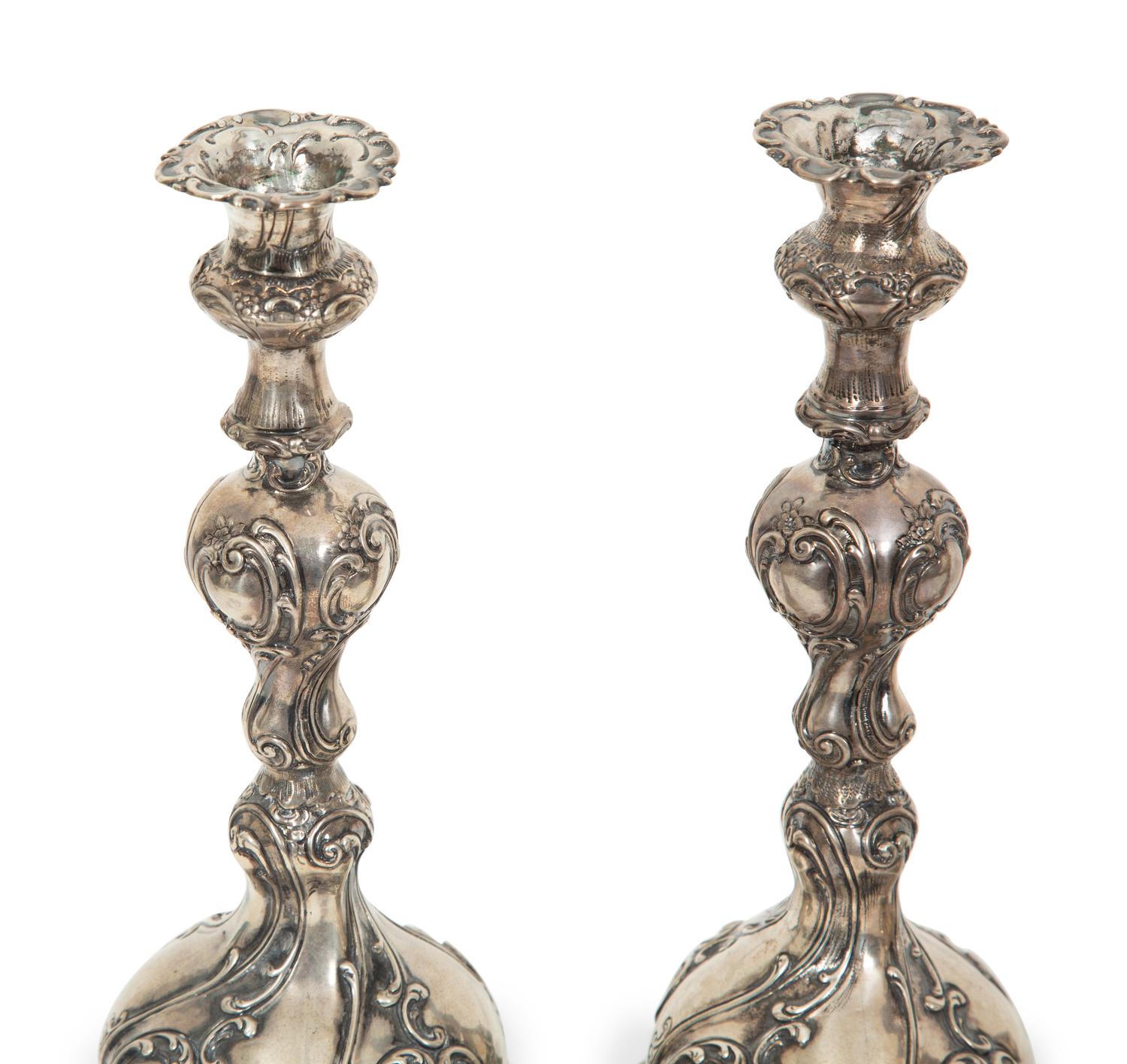 A Set of Four German Silver Candlesticks