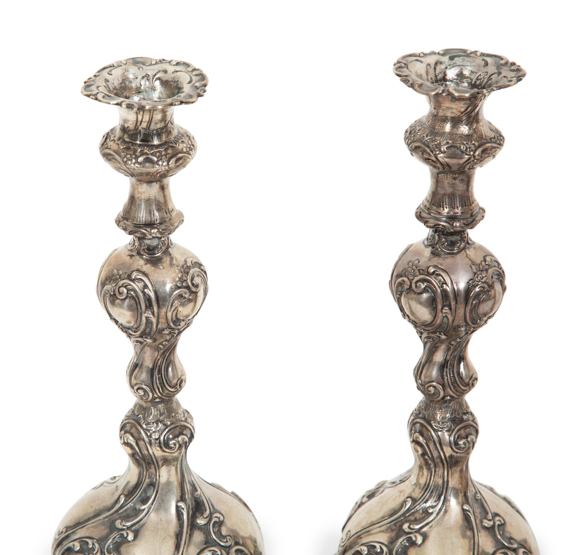A Set of Four German Silver Candlesticks