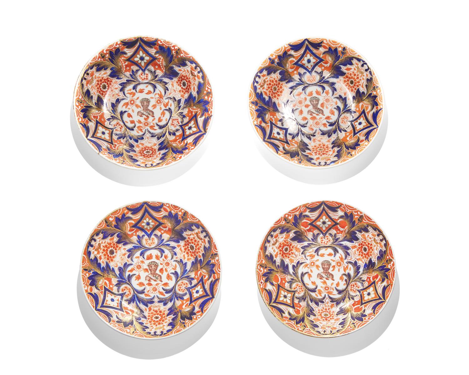 A rare set of four Derby porcelain plates in the Imari palette, circa 1820