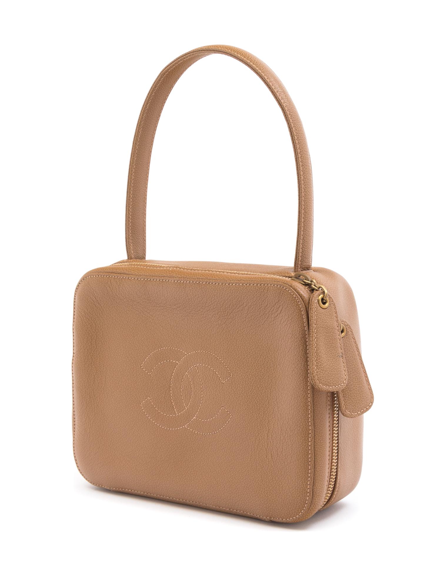 A Chanel Taupe Leather Handbag, 6" x 8" x 2.75".