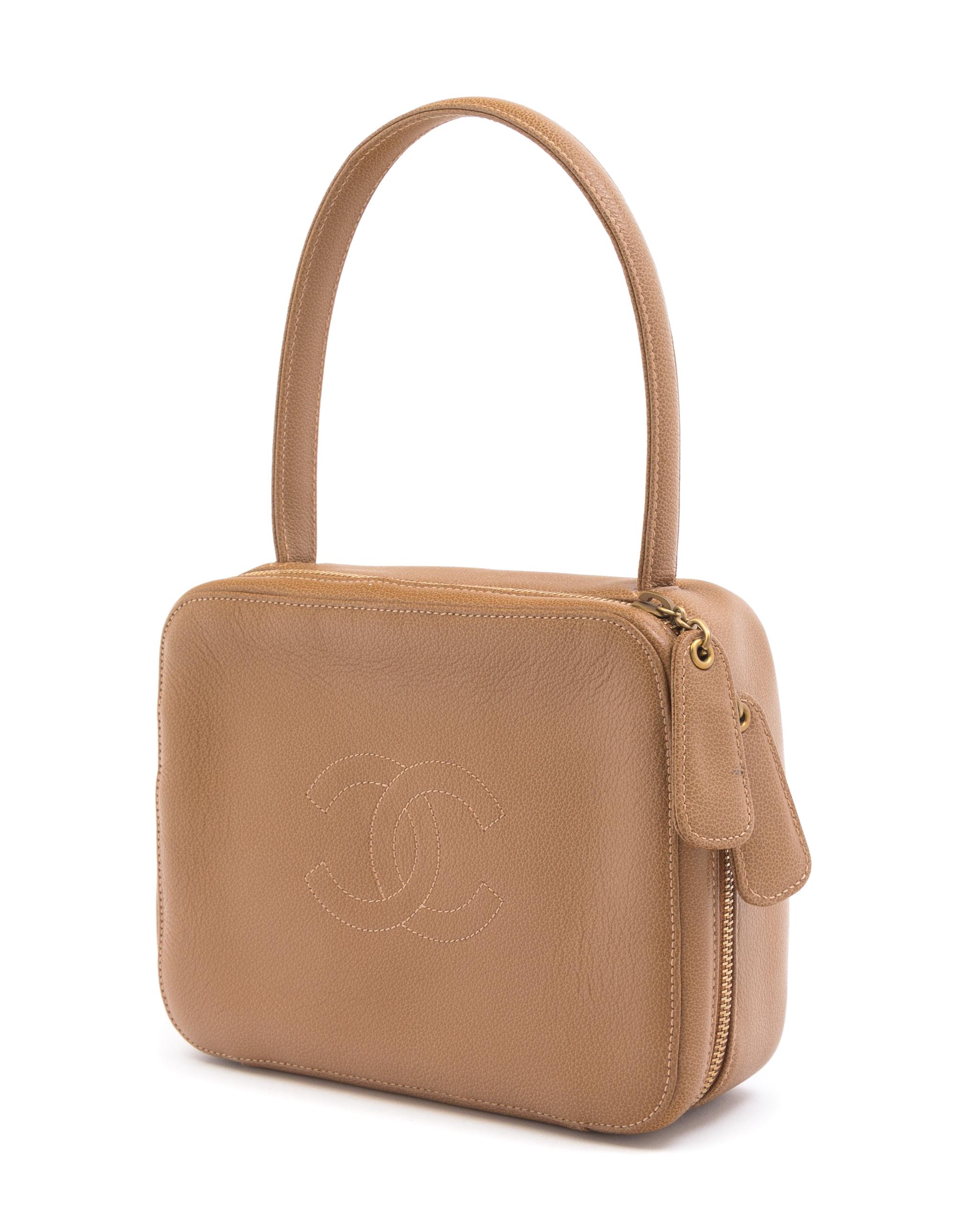 A Chanel Taupe Leather Handbag, 6" x 8" x 2.75".