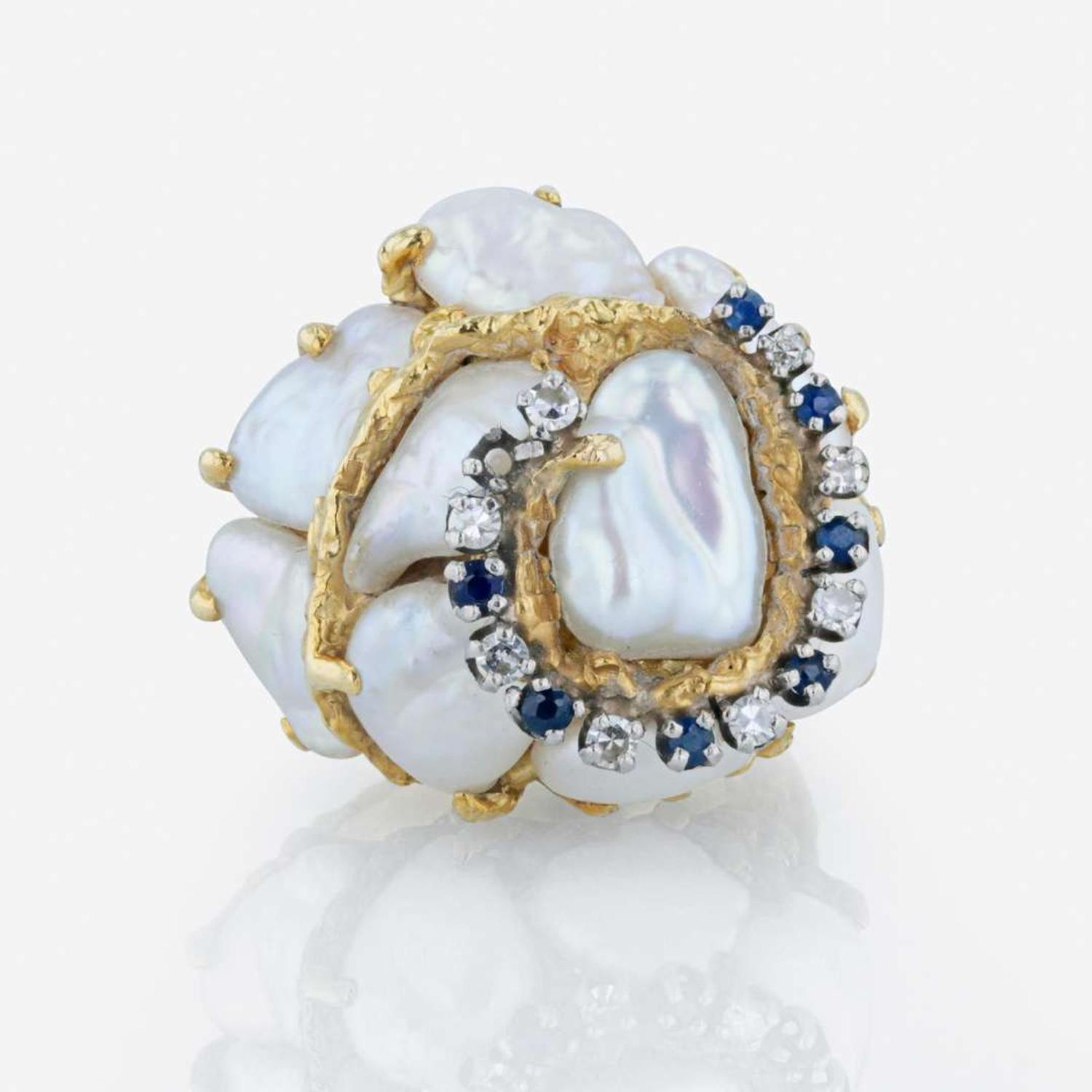 An 18K yellow gold, baroque cultured pearl, diamond, and sapphire ring