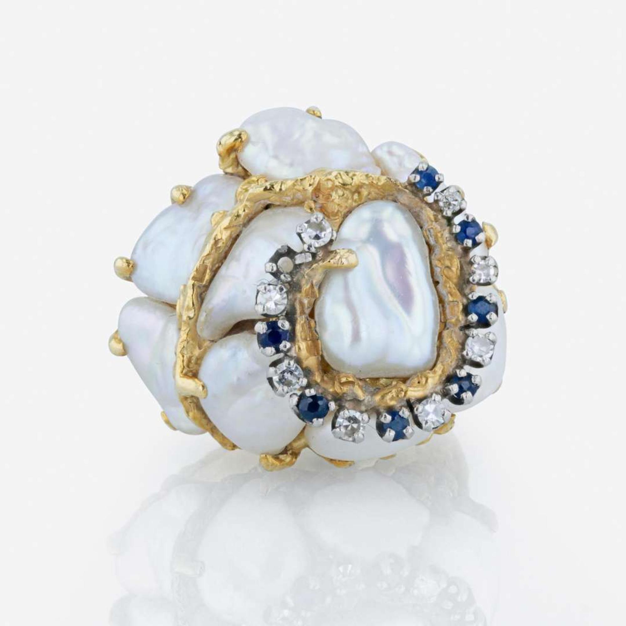 An 18K yellow gold, baroque cultured pearl, diamond, and sapphire ring