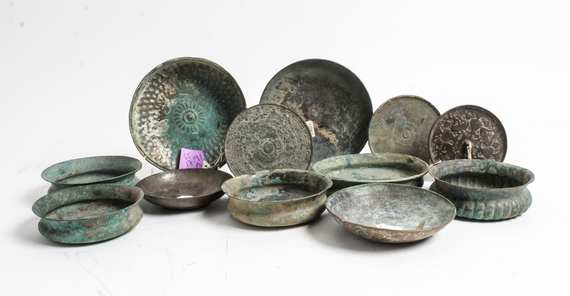 A Collection of Archaic Bronze Bowls and Table Articles Diameter of largest 6 3/4 inches.