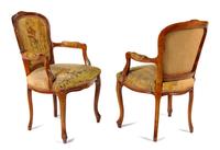 A Pair of Louis XV Fruitwood Fauteuils