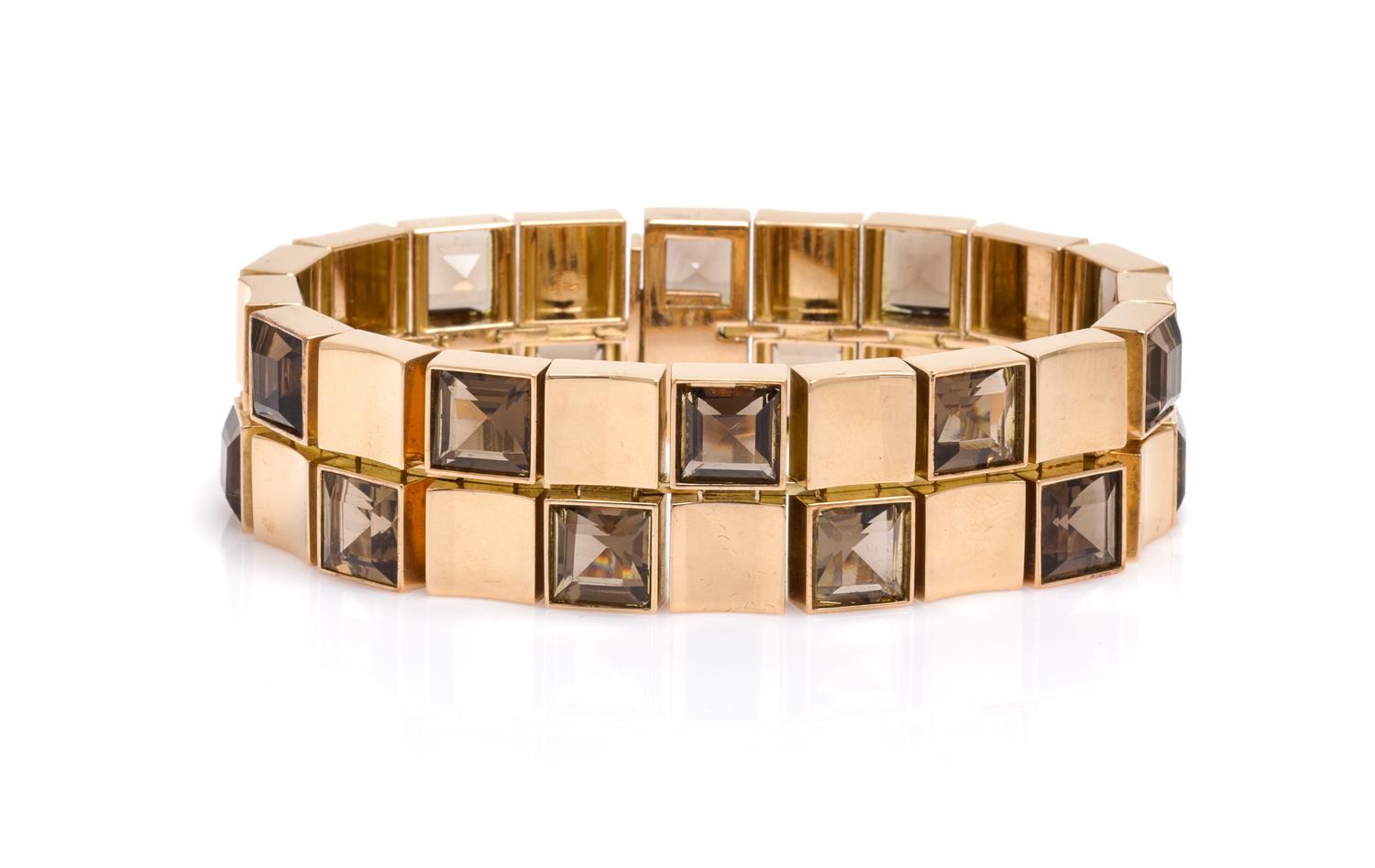 An 18 Karat Yellow Gold and Smokey Quartz Bracelet, 53.50 dwts.