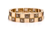 An 18 Karat Yellow Gold and Smokey Quartz Bracelet, 53.50 dwts.