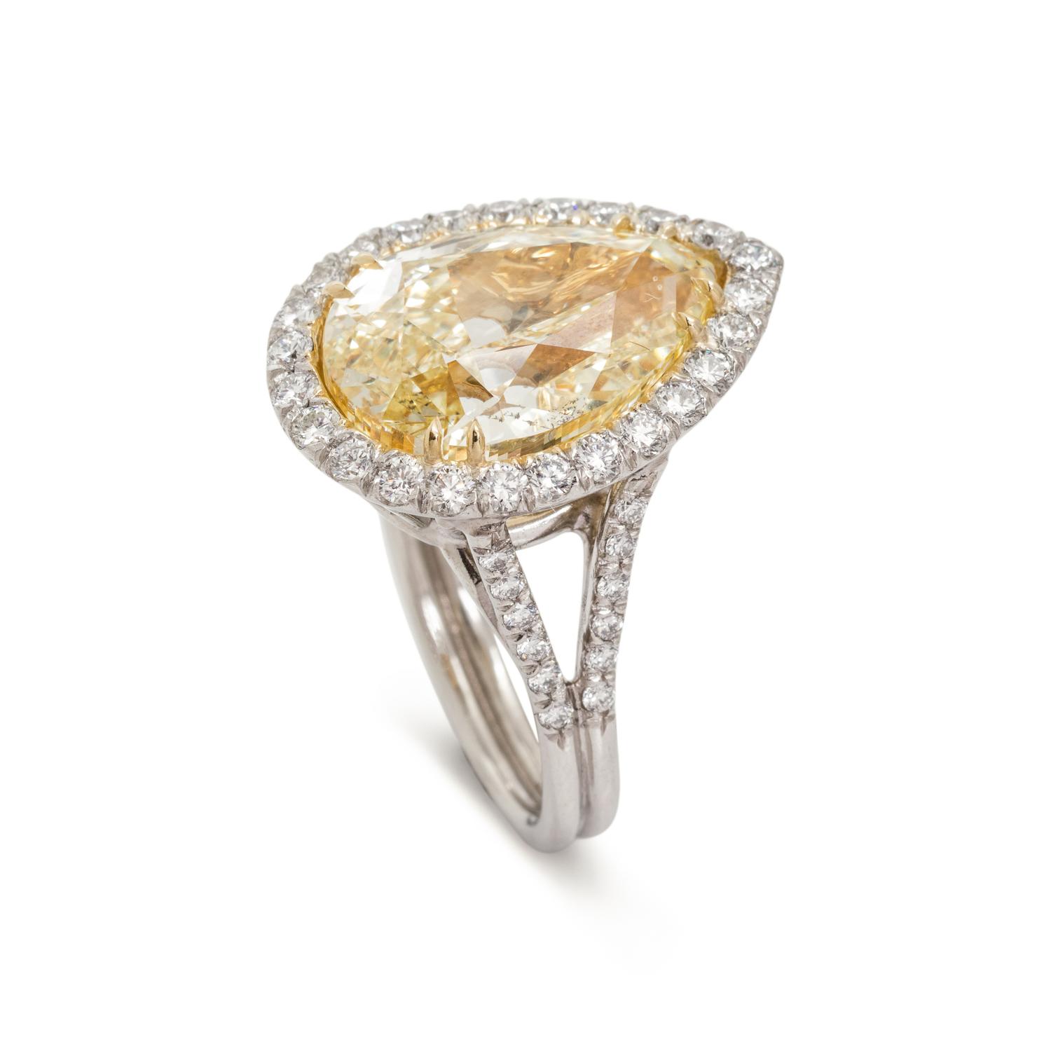 FANCY YELLOW DIAMOND AND DIAMOND RING