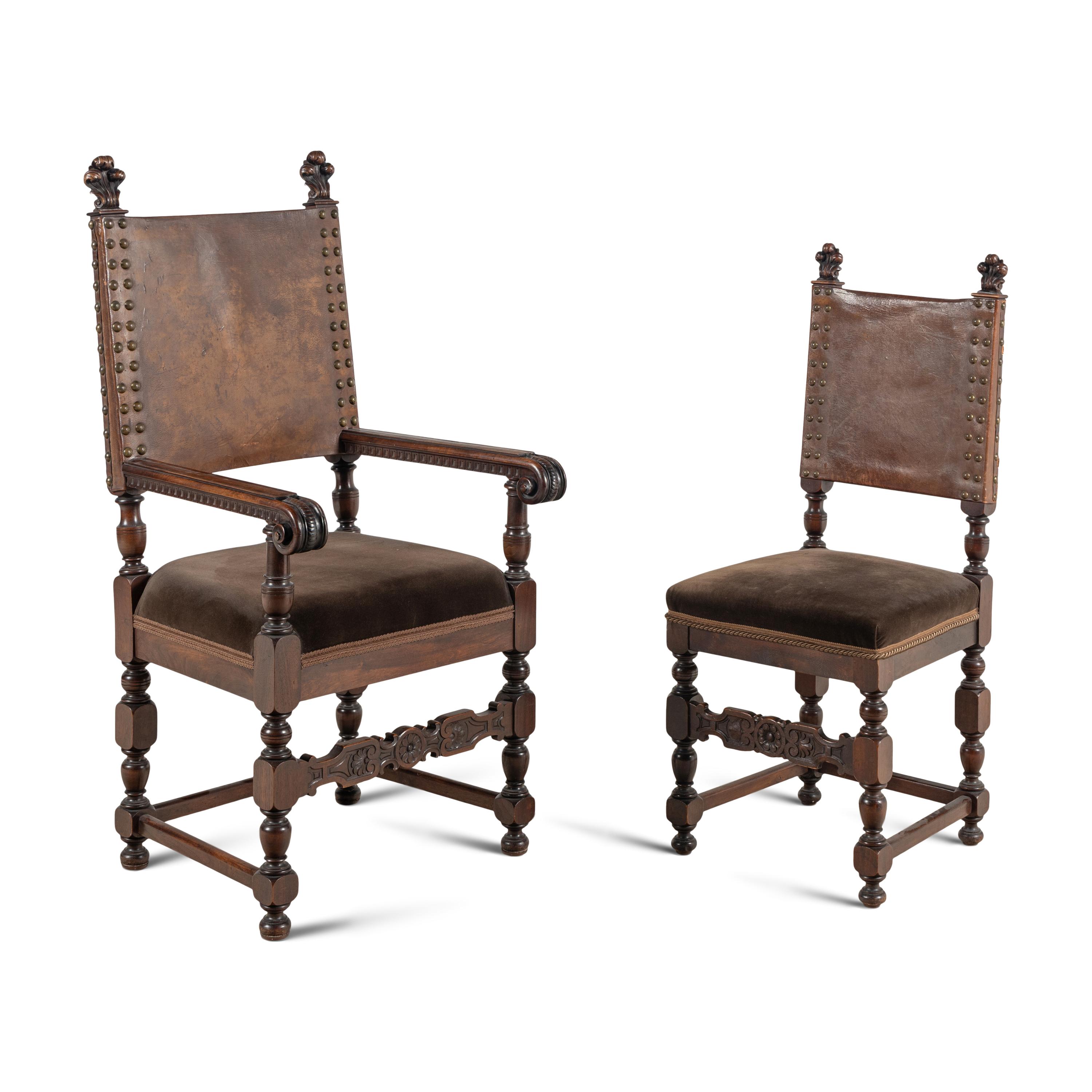 A Set of Twelve Spanish Baroque Style Walnut and Leather Dining Chairs