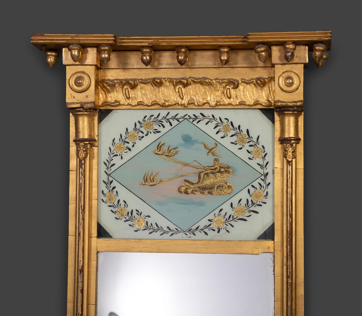 A Federal Giltwood and Eglomise Decorated Looking Glass