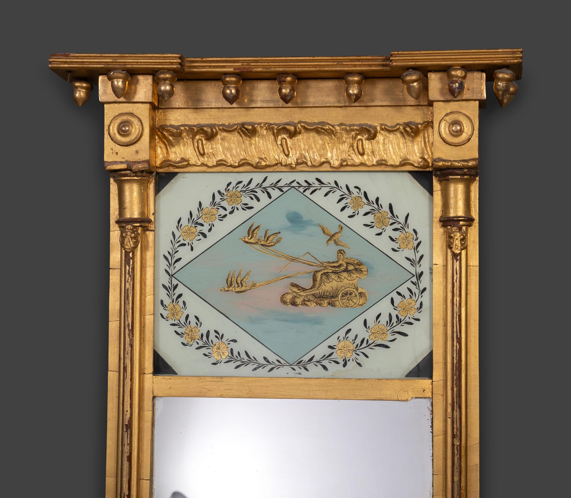 A Federal Giltwood and Eglomise Decorated Looking Glass