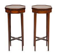 A Pair of George III Style Mahogany Candle Stands