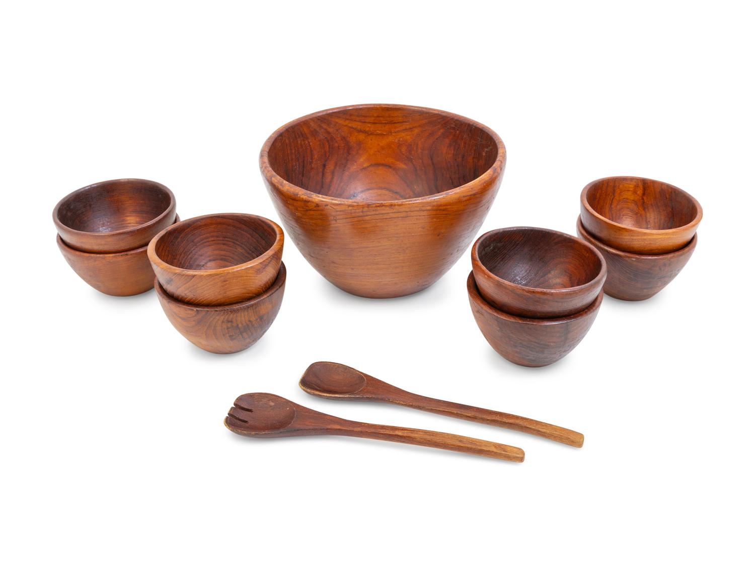 A Carved Wood Salad Serving Set
