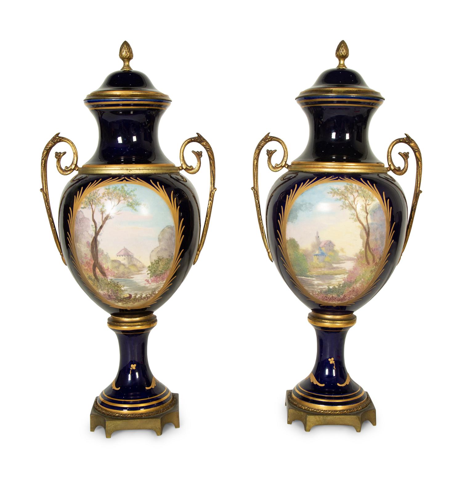 A Pair of Sèvres Style Porcelain Urns