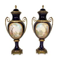 A Pair of Sèvres Style Porcelain Urns
