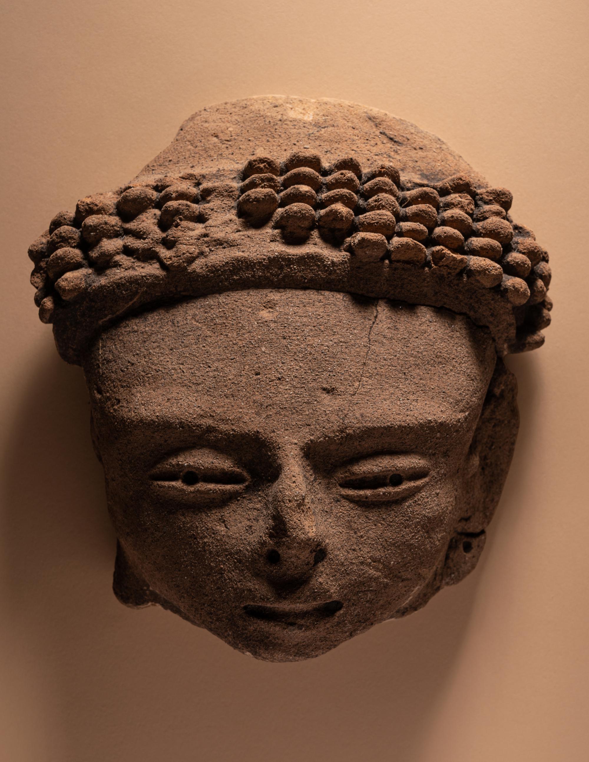 A Veracruz Head and Tlatilco Head