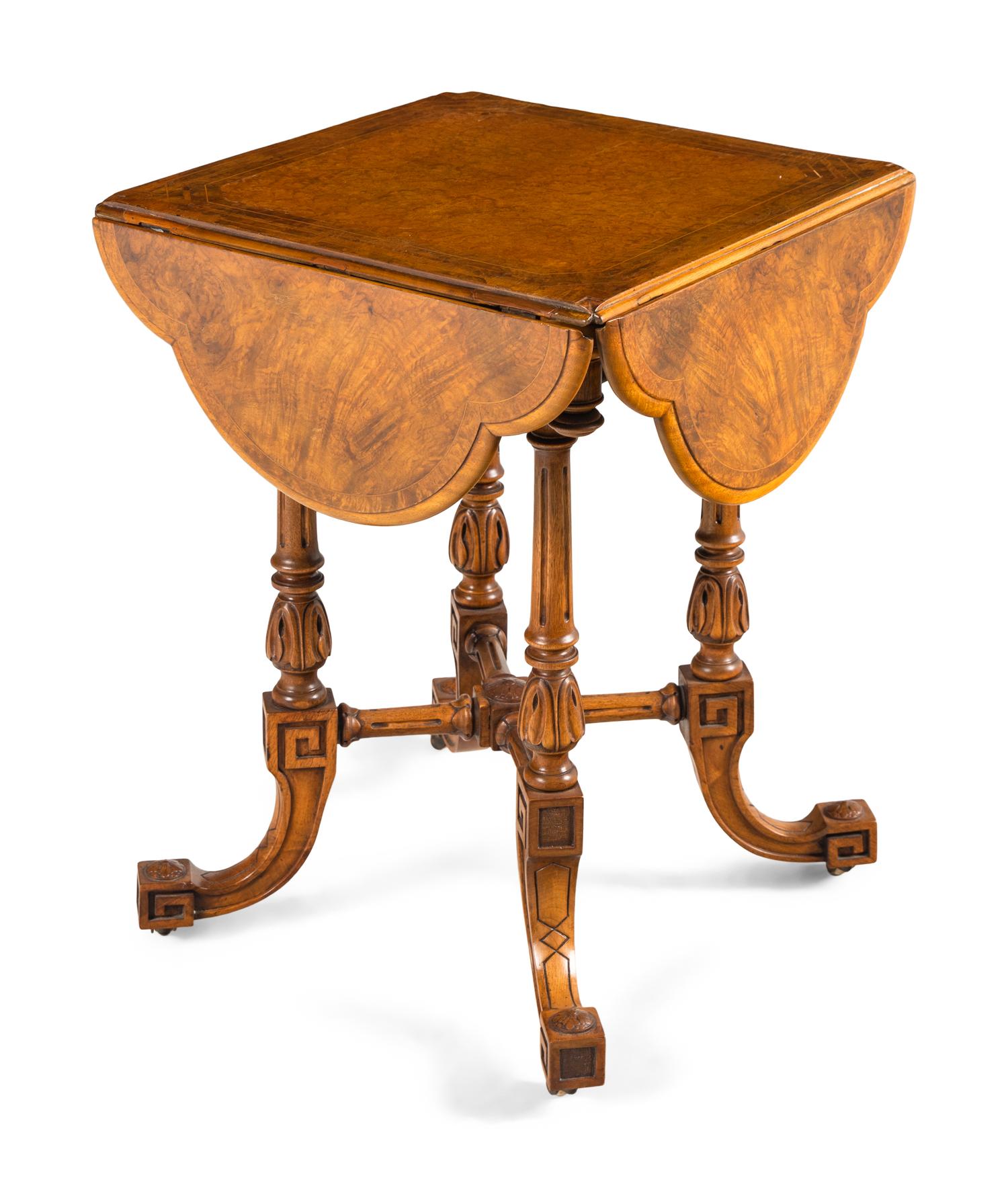 A Neoclassical Walnut Drop-Leaf Table