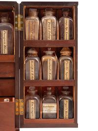 A Regency Figured Mahogany Travelling Apothecary Chest