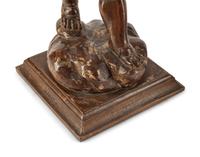 A Pair of Continental Carved Walnut Figures of Putti