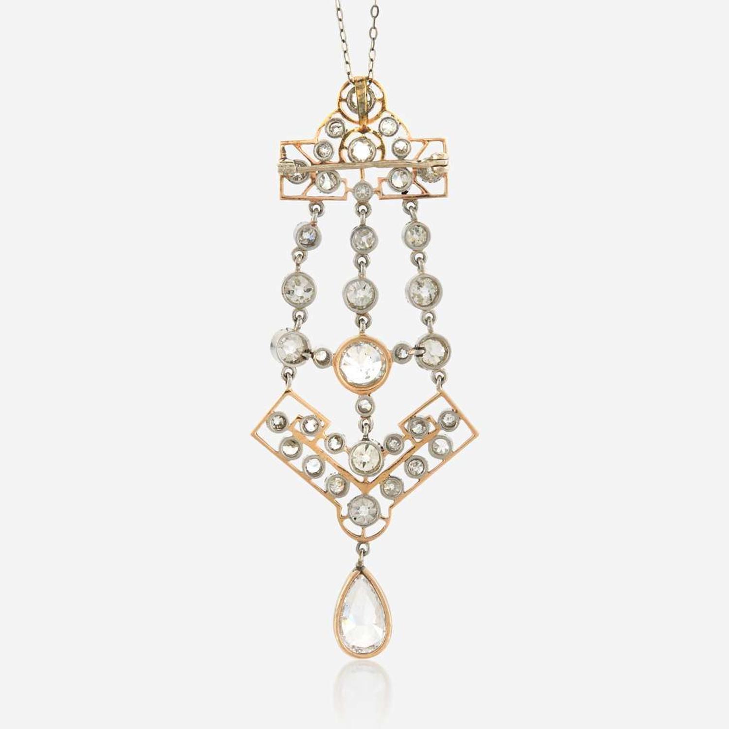 A diamond and platinum topped gold pendant