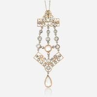 A diamond and platinum topped gold pendant