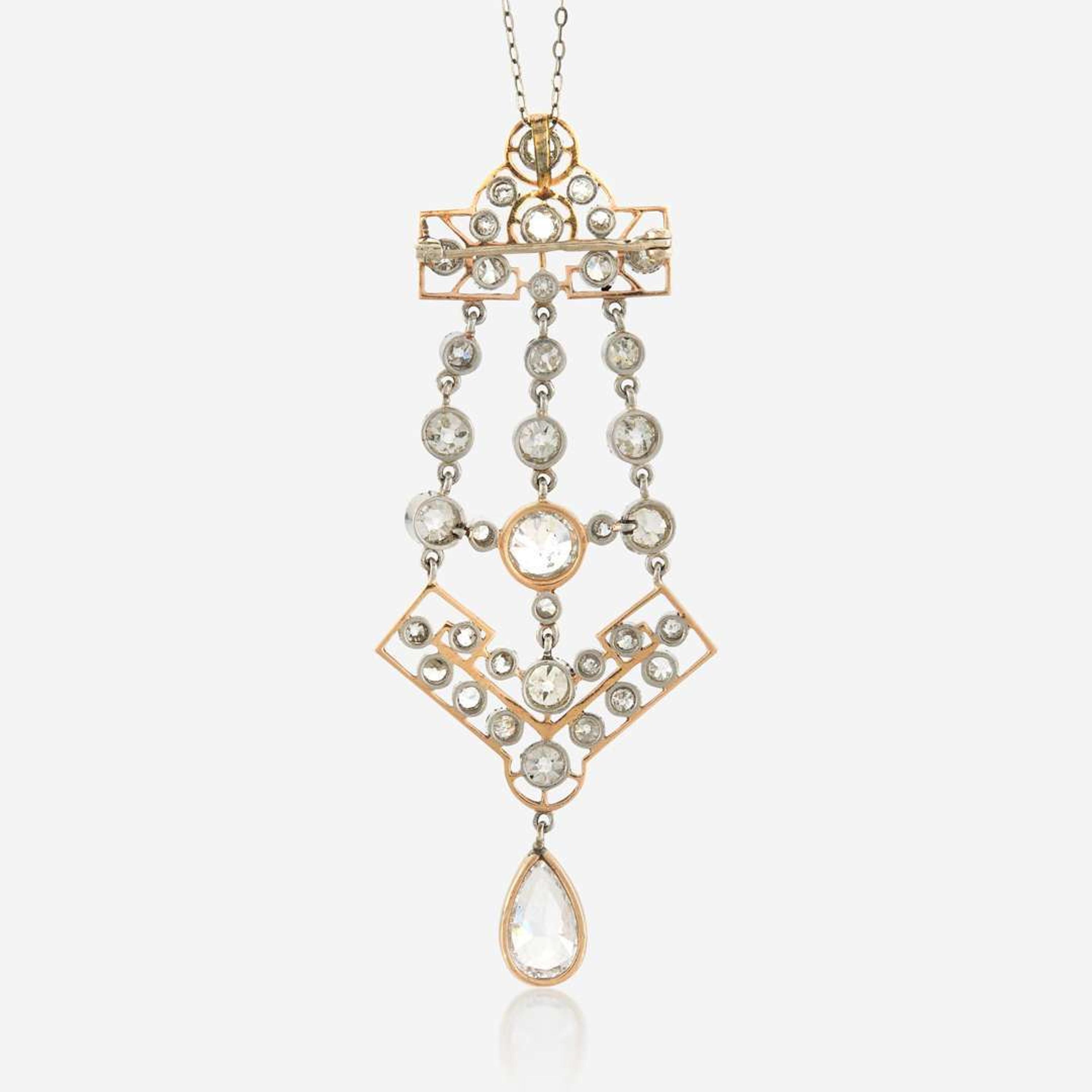 A diamond and platinum topped gold pendant