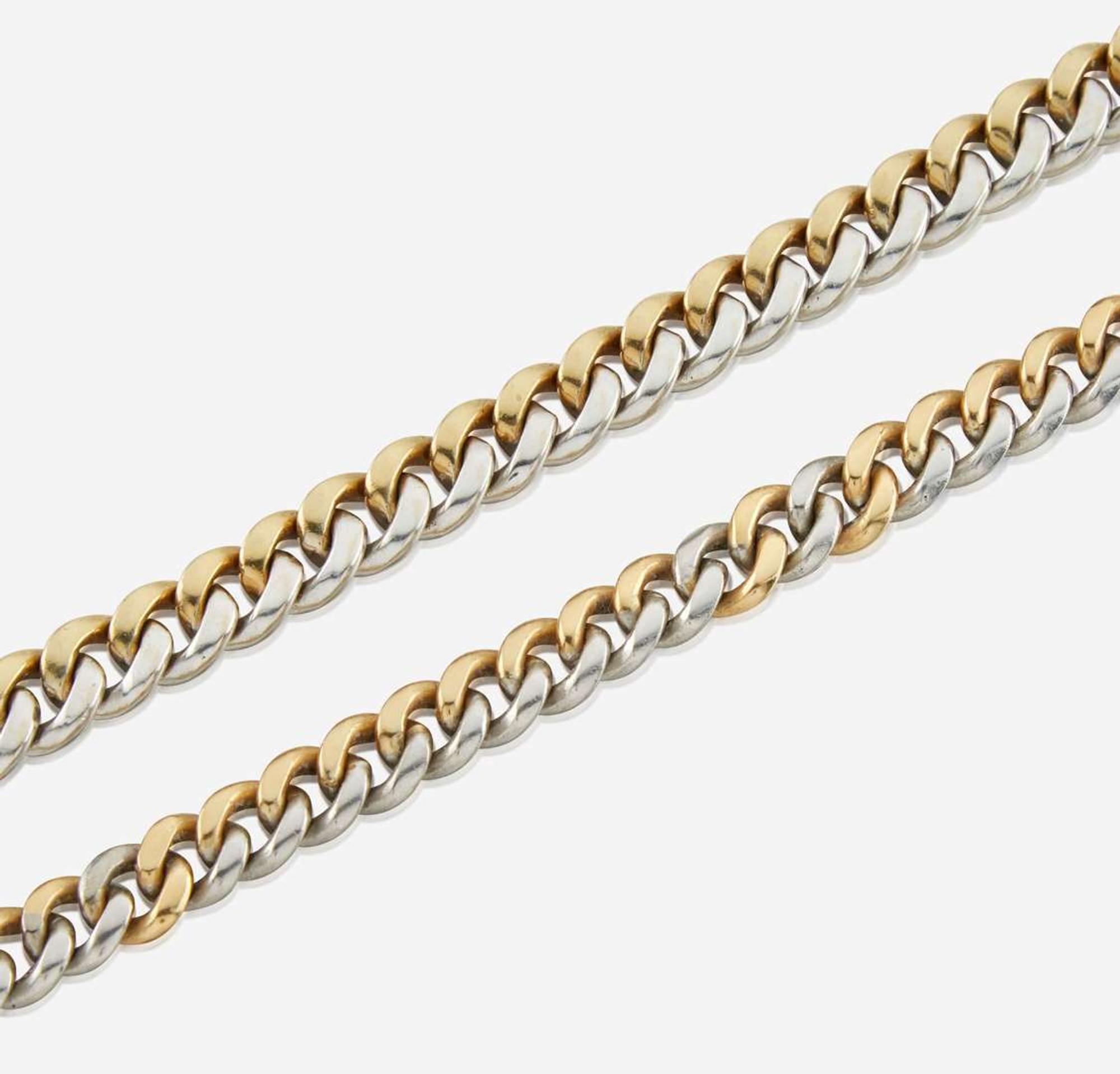 A bicolor gold necklace and matching bracelet Italy