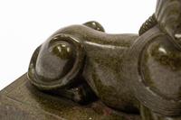 A Pair of Continental Patinated Metal Sphinxes