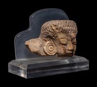 An Indian Sandstone Head of a Female Deity