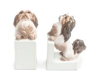 A Pair of Dahl Jensen Porcelain Figural Bookends Height 6 1/2 inches. — 20TH CENTURY