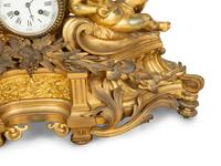 A Napoleon III Gilt Bronze Mantel Clock