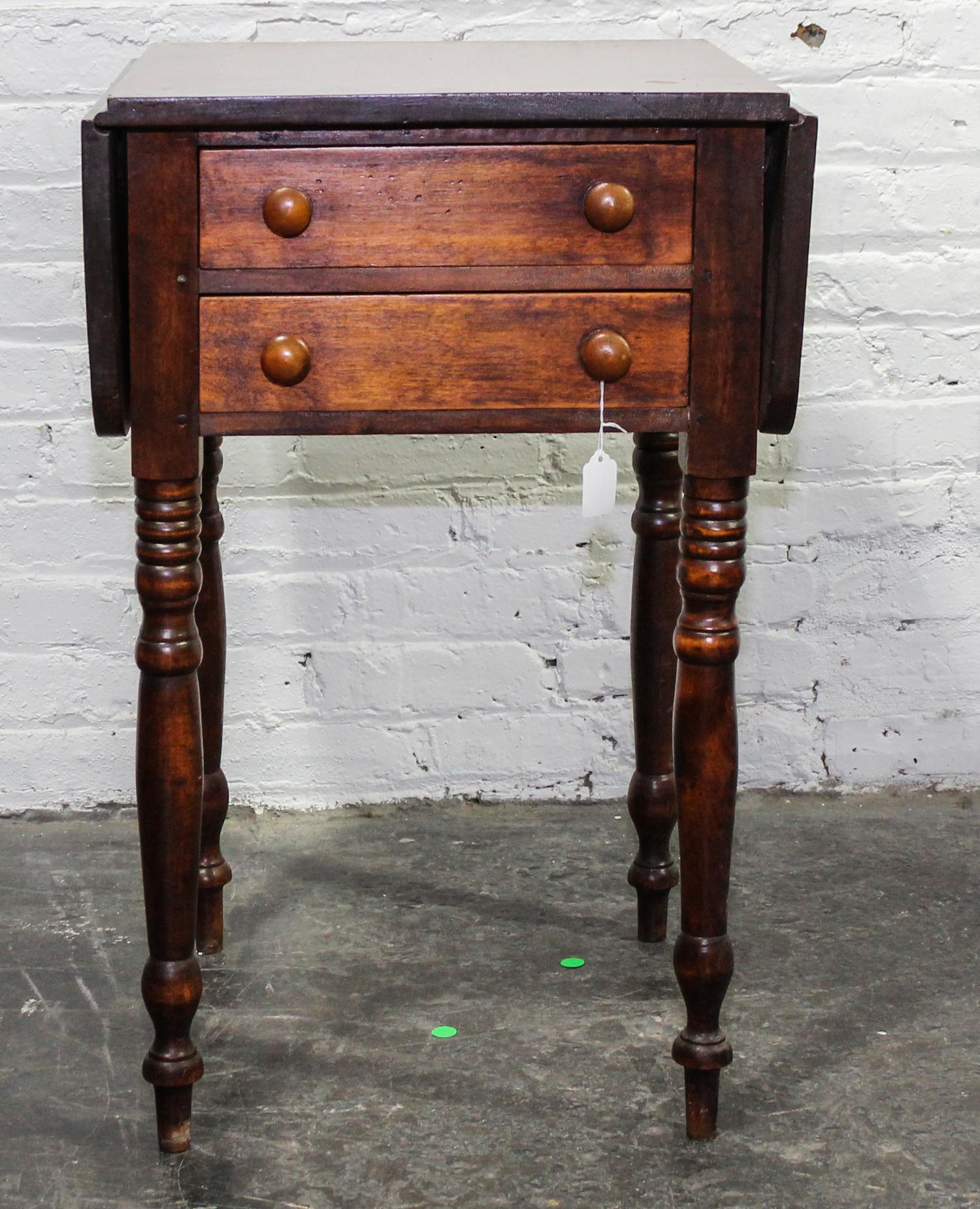 An American Cherry Drop Leaf Work Table Height 28 1/2 x width 18 1/2 x depth 18 3/4 inches (closed). — 19TH/20TH CENTURY