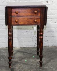 An American Cherry Drop Leaf Work Table Height 28 1/2 x width 18 1/2 x depth 18 3/4 inches (closed). — 19TH/20TH CENTURY