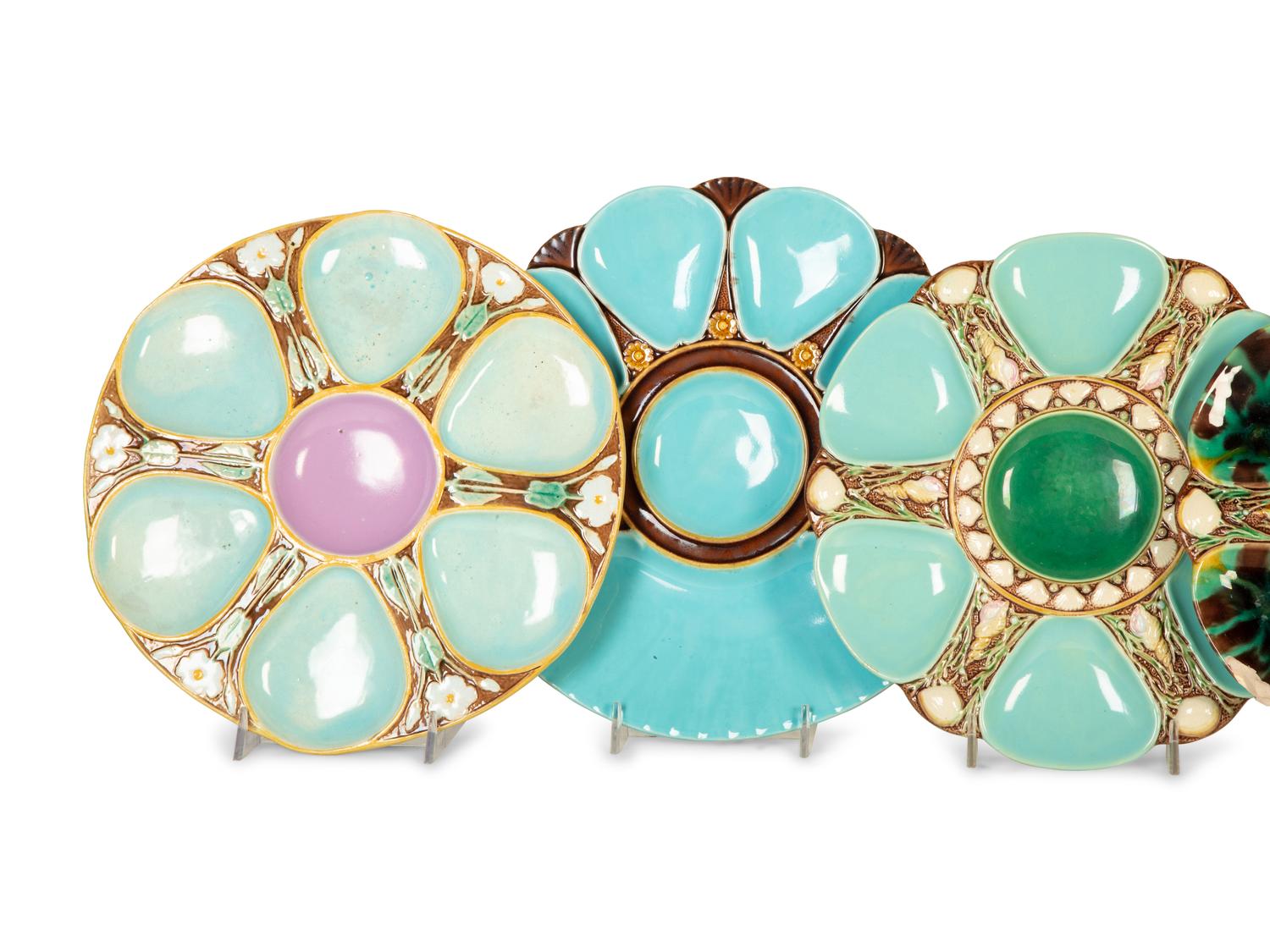 A Group of Eight English and French Majolica Six-Well Oyster Plates — Mid-19th Century