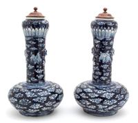 A Pair of Chinese Blue and White Garlic Head-Shaped Vases Height 13 1/2 inches. — 19TH CENTURY