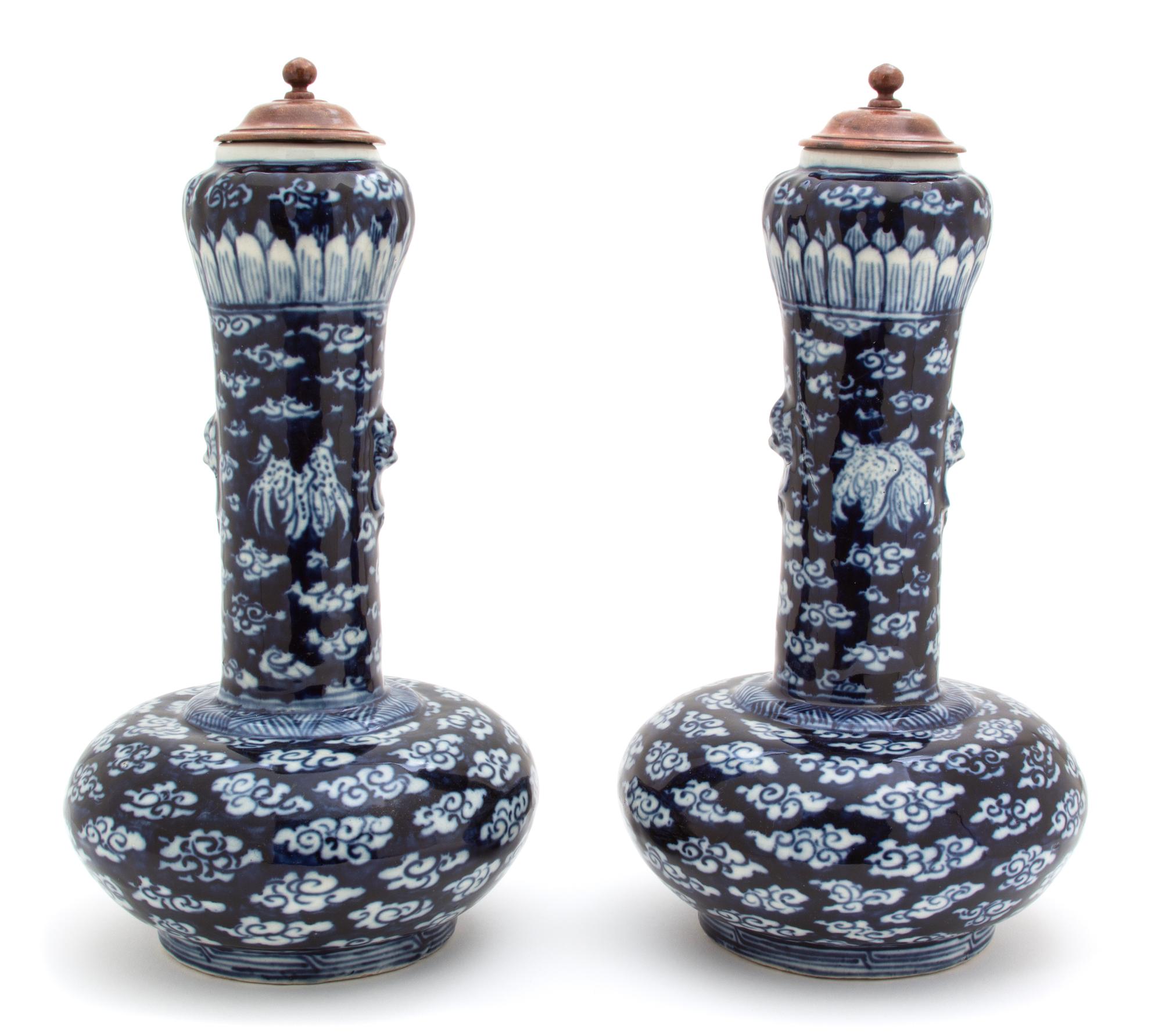 A Pair of Chinese Blue and White Garlic Head-Shaped Vases Height 13 1/2 inches. — 19TH CENTURY