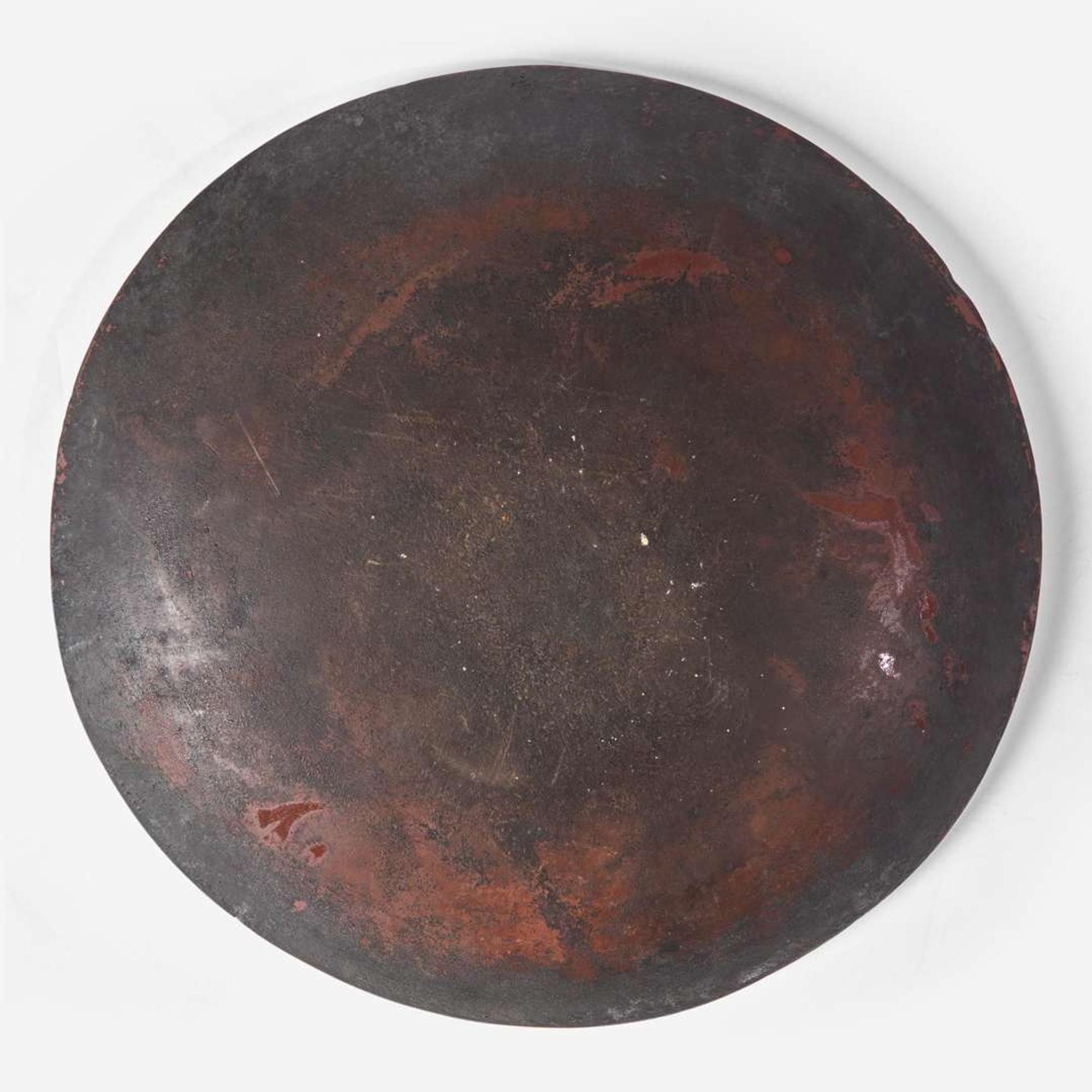 A slip-decorated and glazed redware dish 19th century