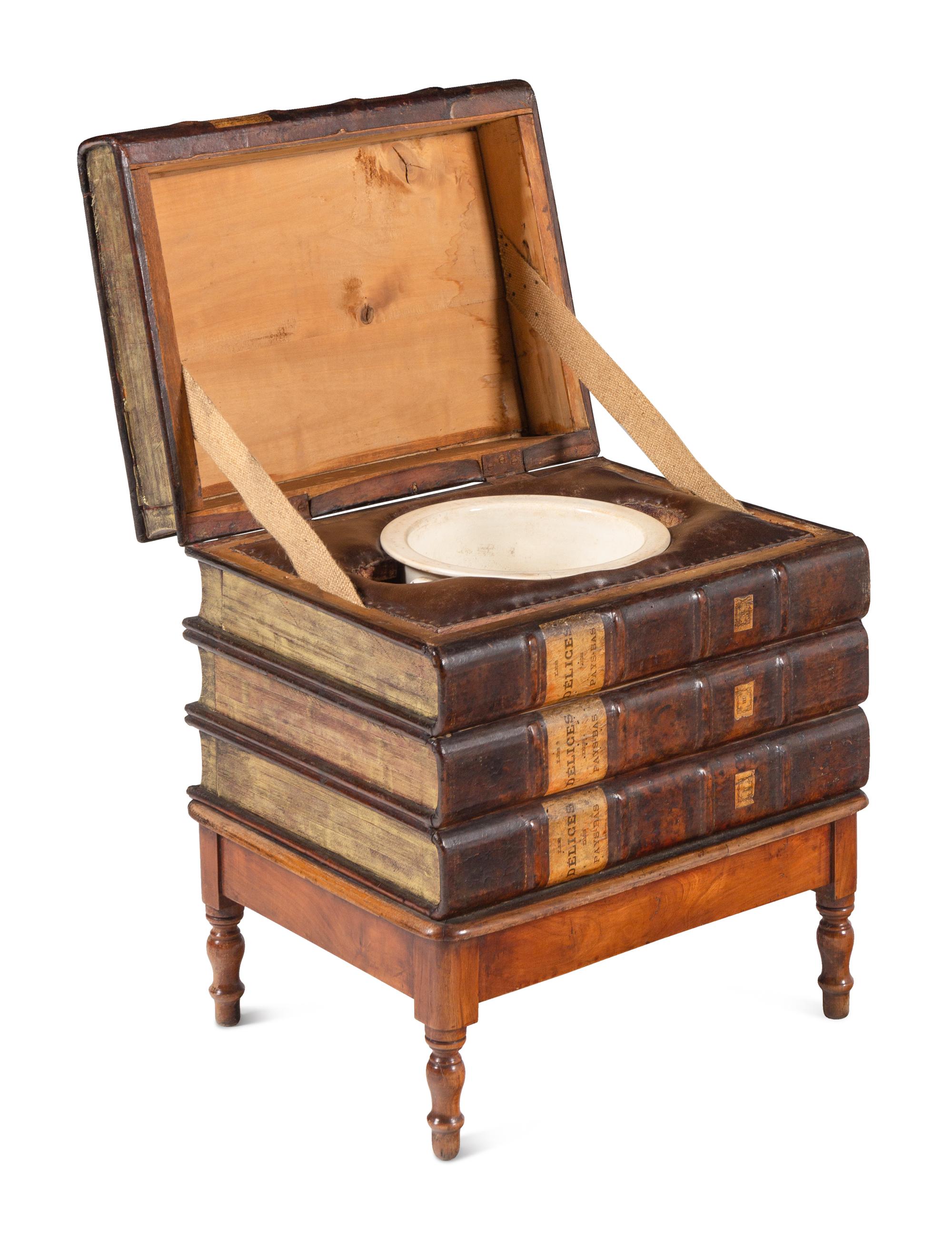 A Louis Philippe Book Spine and Birch Low Storage Table