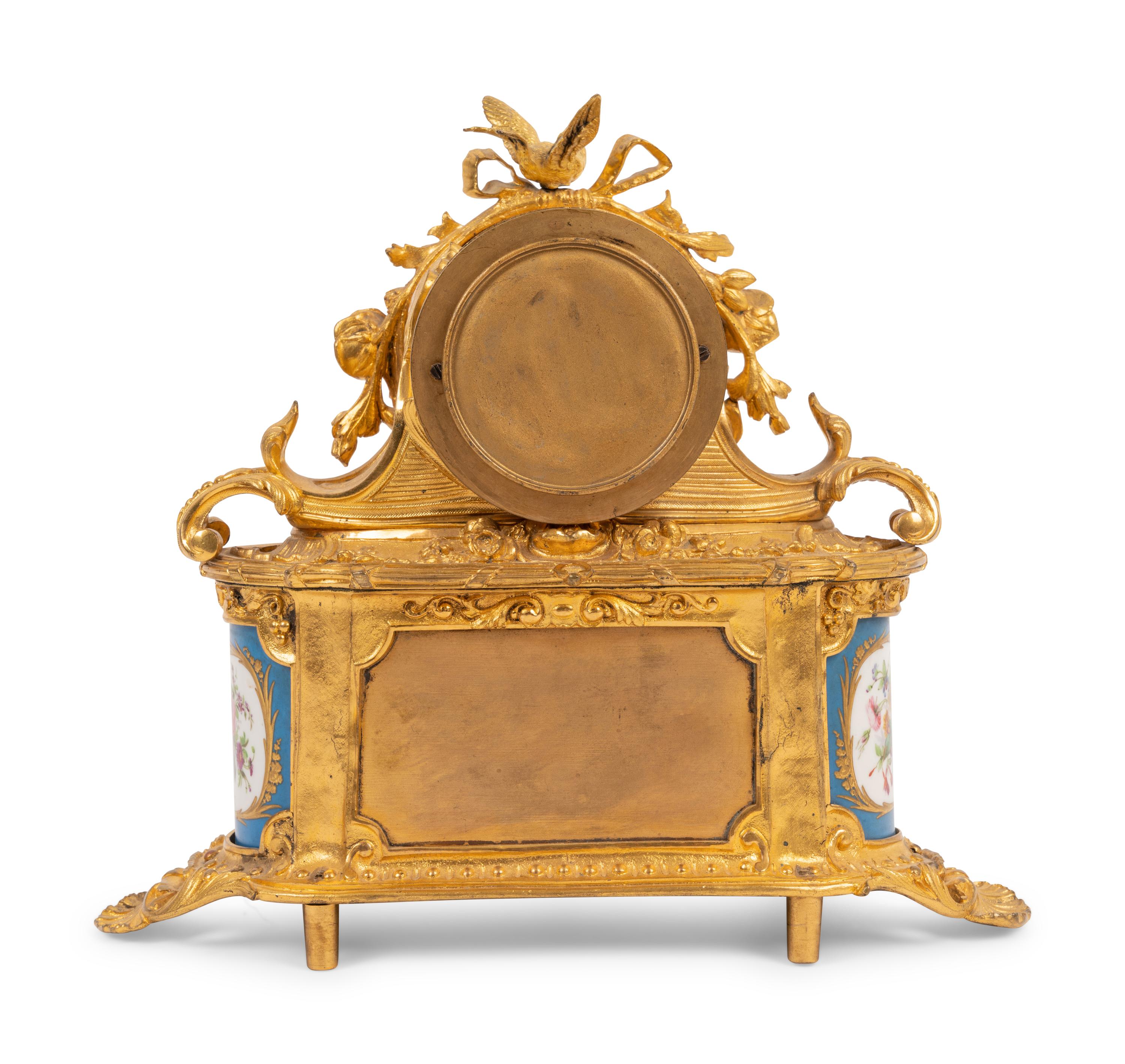 A French Gilt Bronze and Sèvres Style Porcelain Mantel Clock