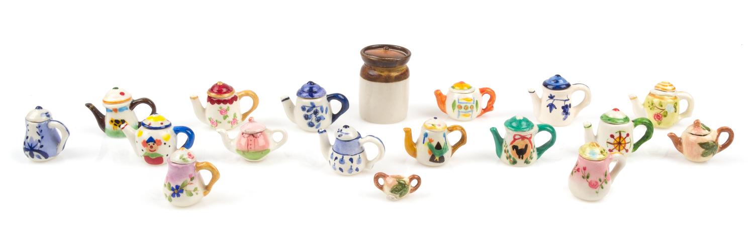 A Collection of Pottery Articles Height 1 1/8 inches.