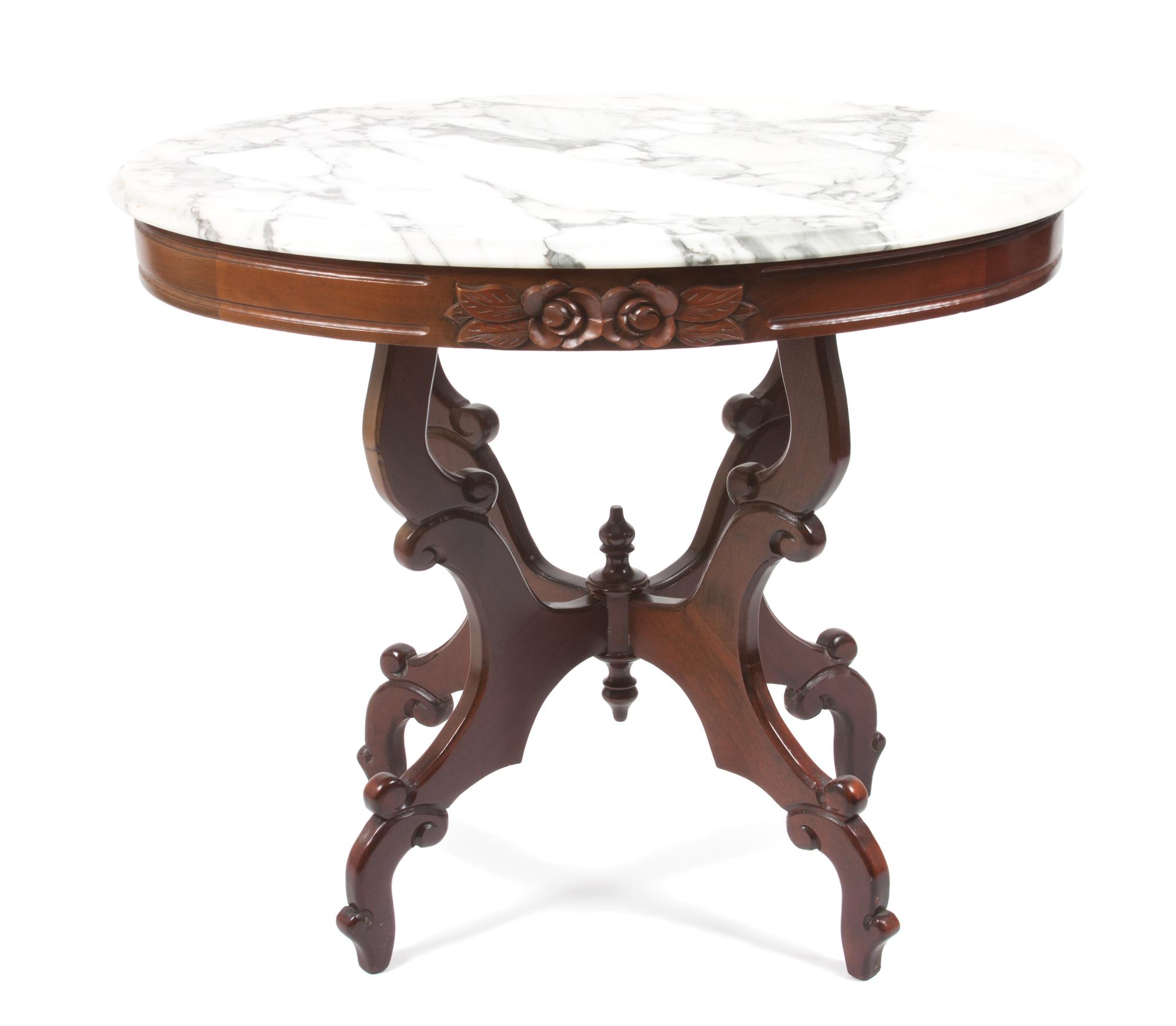 A Victorian Walnut Parlor Table Height 27 x width 33 x depth 21 1/2 inches.