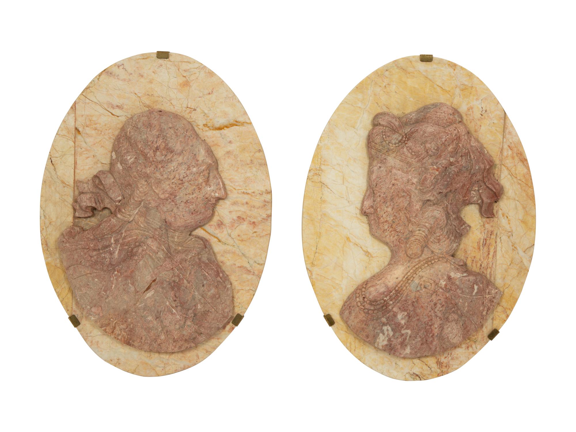 A Pair of Bi-Color Marble Profile Portrait Plaques