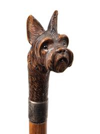 Two English Glass-Inset Carved Wood Dog's Head Canes