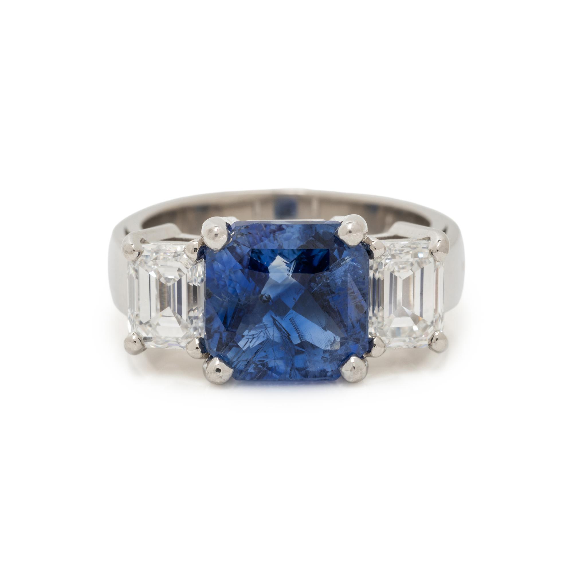 PLATINUM, SAPPHIRE, AND DIAMOND RING