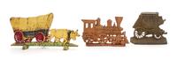 Three Cast Iron Doorstops Width of covered wagon 14 inches.