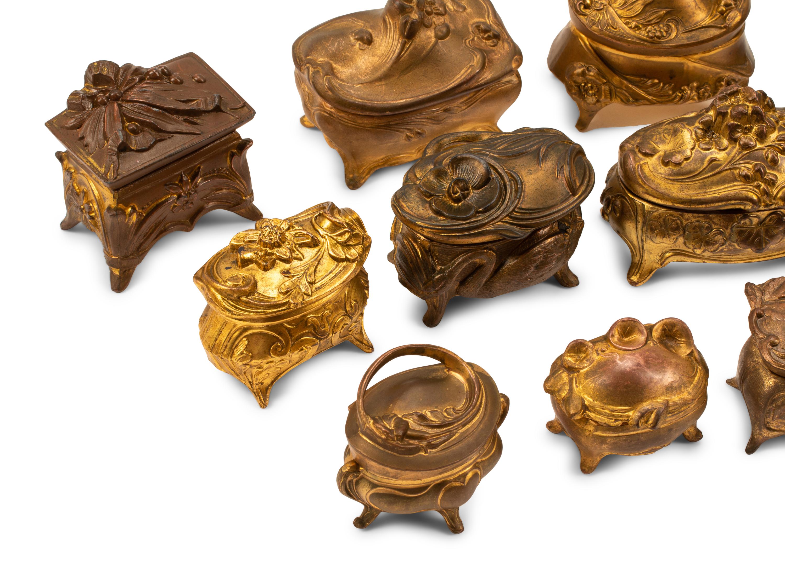A Collection of Sixteen French Bronze and Metal Small Boxes