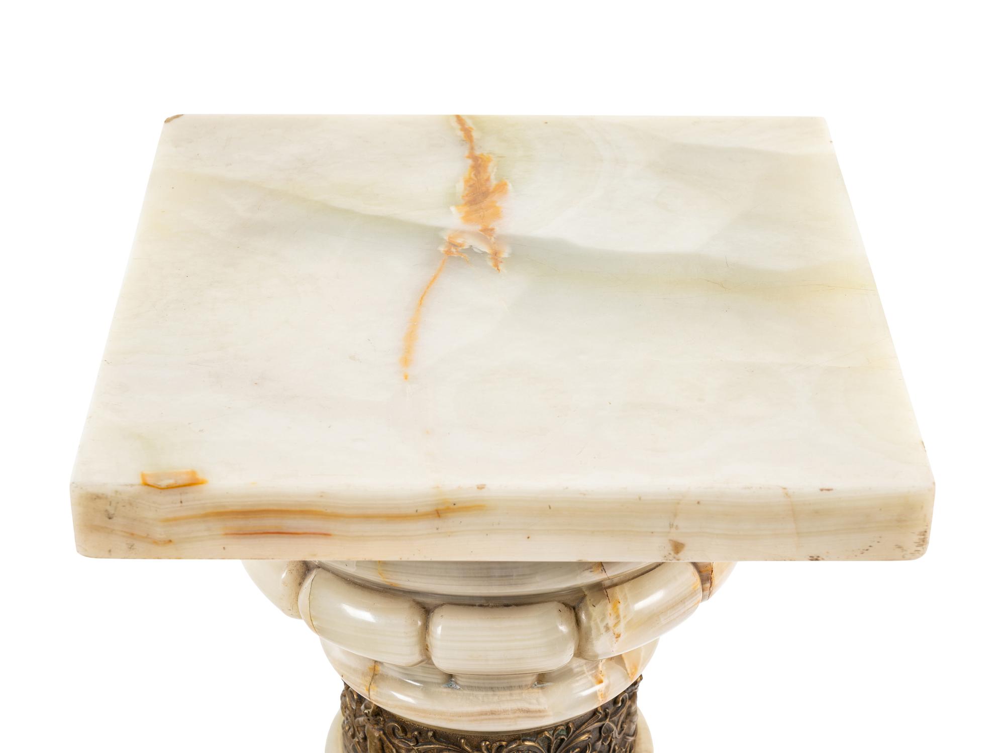 A Continental Gilt Metal Mounted Onyx Pedestal